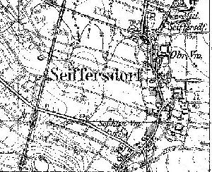 Powiększ Fragment niemieckiej mapy topograficznej z 1933 r.. W lewym, dolnym rogu, tuż poniżej przejazdu kolejowego widać stację Radwanów (Bf). Prawdopodobnie były dwa boczne tory i jakiś budynek za torowiskiem (patrząc od strony wsi).